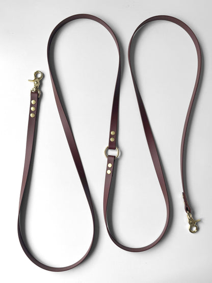 Brown biothane dog leash with gold hardware on a white background brązowa  smycz z biothane hands-free idealna na spacer HOPSA